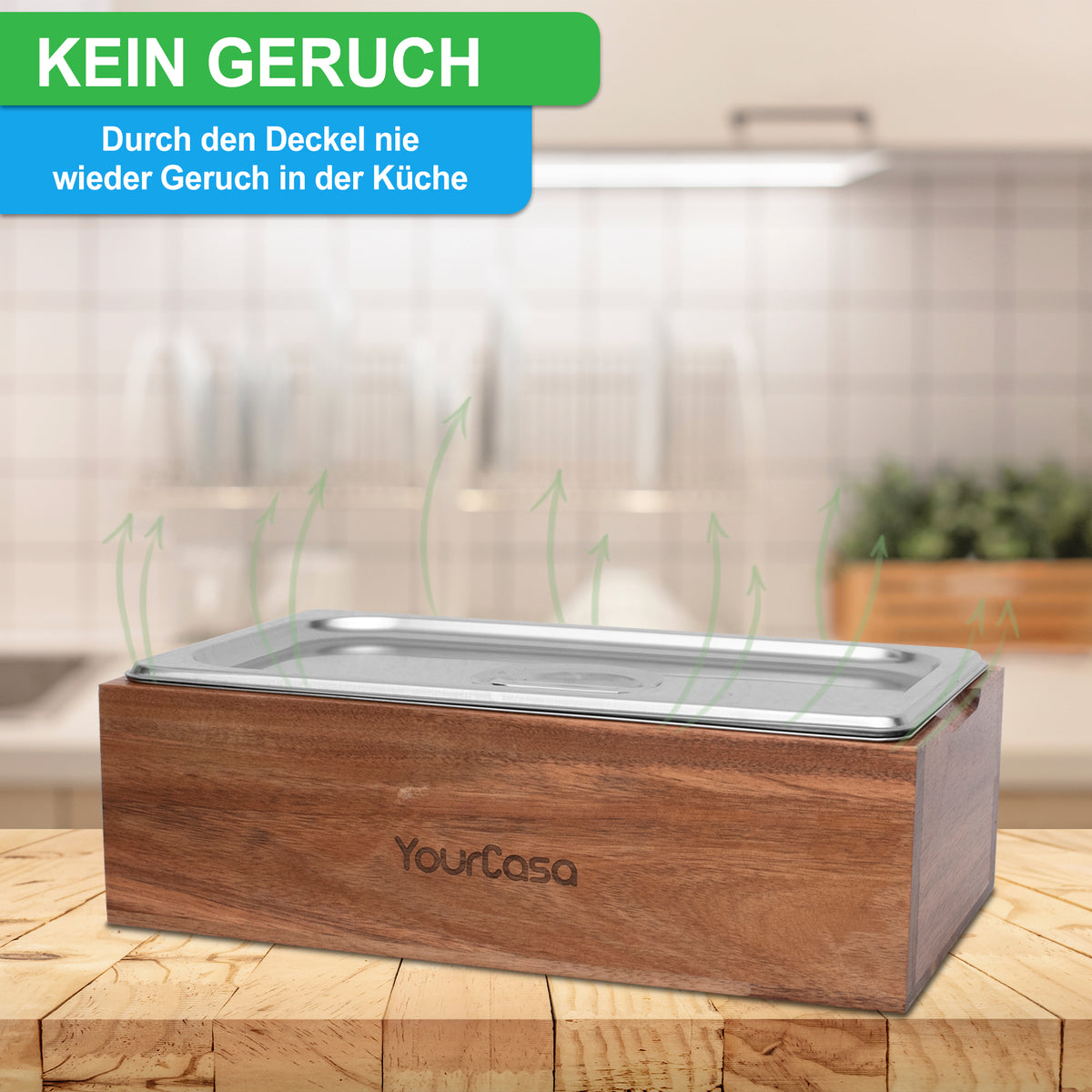 Ein moderner, geruchsdichter YourCasa® Komposteimer aus Echtholz und Edelstahl – spülmaschinenfest mit herausnehmbarem Einsatz mit der Aufschrift „Kein Geruch – nie wieder Geruch in der Küche“ auf einer yourcisade.com.